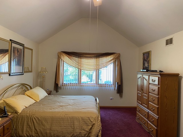 Undisclosed Address Olympia Fields, IL 60461 - Photo 8 of 31 a bedroom with a bed and a window