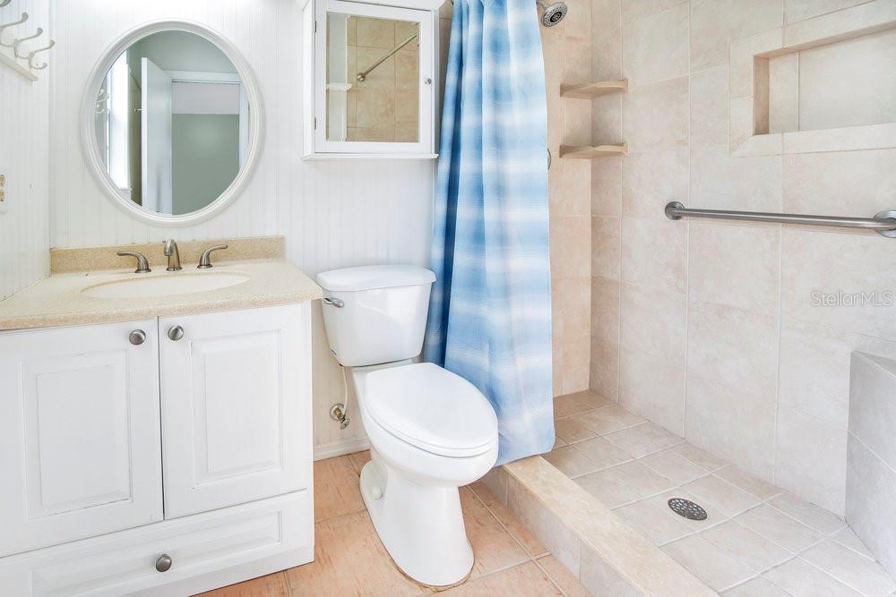 1500 Rivers Edge Drive Orlando, FL 32825 - Photo 14 of 33 a bathroom with a toilet sink and shower