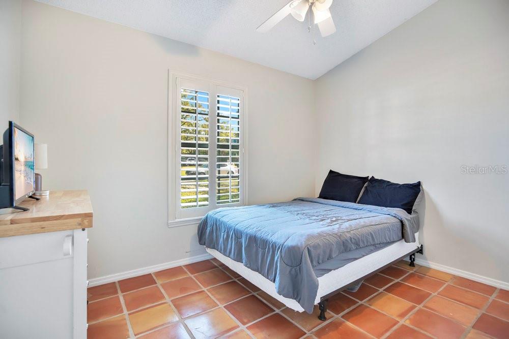 1500 Rivers Edge Drive Orlando, FL 32825 - Photo 16 of 33 a bedroom with a bed and a window