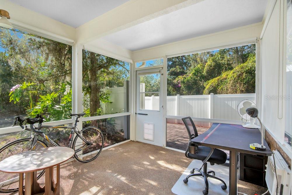 1500 Rivers Edge Drive Orlando, FL 32825 - Photo 19 of 33 a view of a workspace with a table and chairs in the room