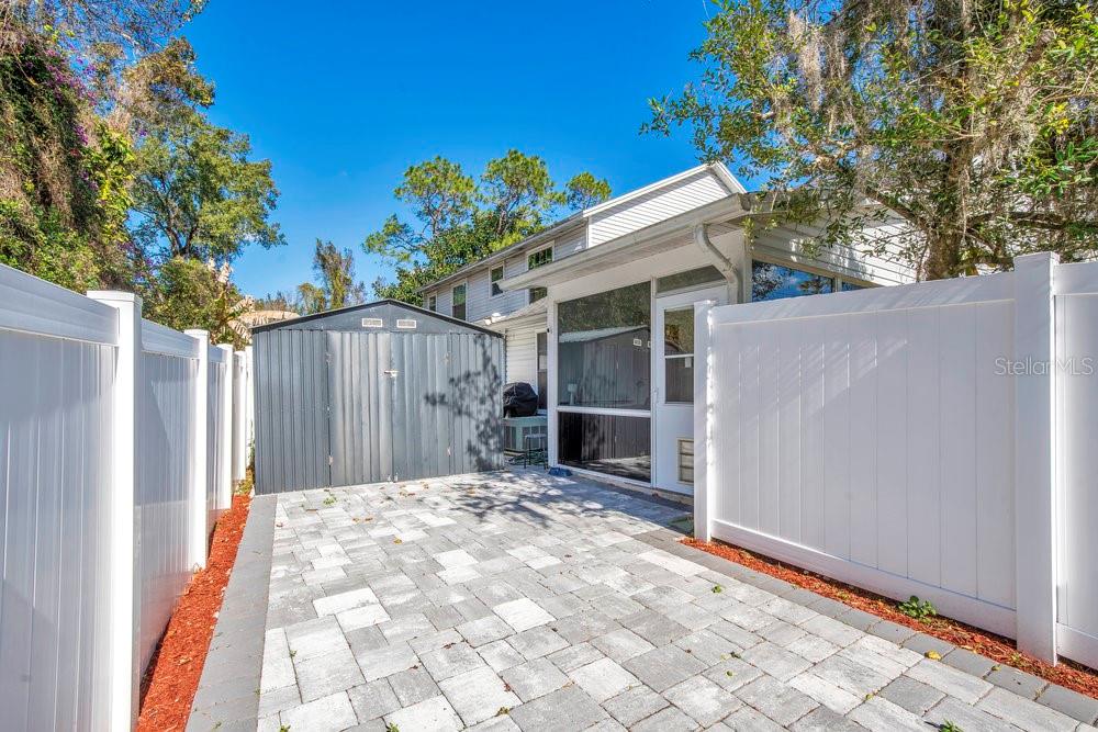 1500 Rivers Edge Drive Orlando, FL 32825 - Photo 20 of 33 a backyard of a house with a tree