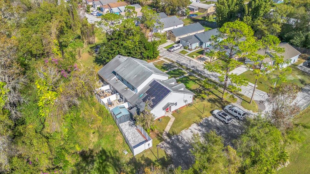 1500 Rivers Edge Drive Orlando, FL 32825 - Photo 30 of 33 an aerial view of residential house with swimming pool and lawn chairs