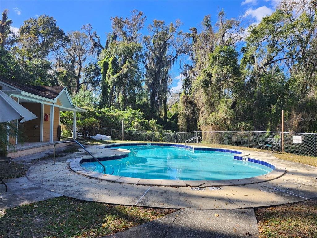 1500 Rivers Edge Drive Orlando, FL 32825 - Photo 32 of 33 a view of a swimming pool with a patio