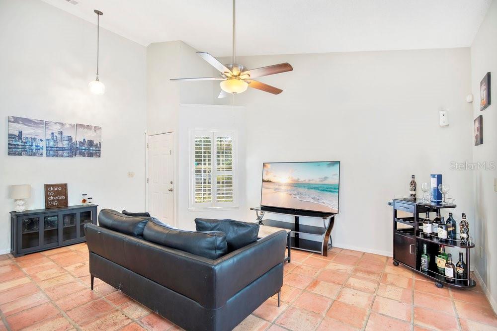 1500 Rivers Edge Drive Orlando, FL 32825 - Photo 5 of 33 a living room with furniture ceiling fan and a window