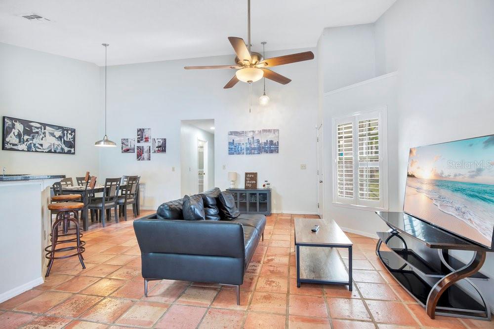 1500 Rivers Edge Drive Orlando, FL 32825 - Photo 6 of 33 a living room with furniture and a flat screen tv