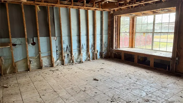 a view of a backyard of a house