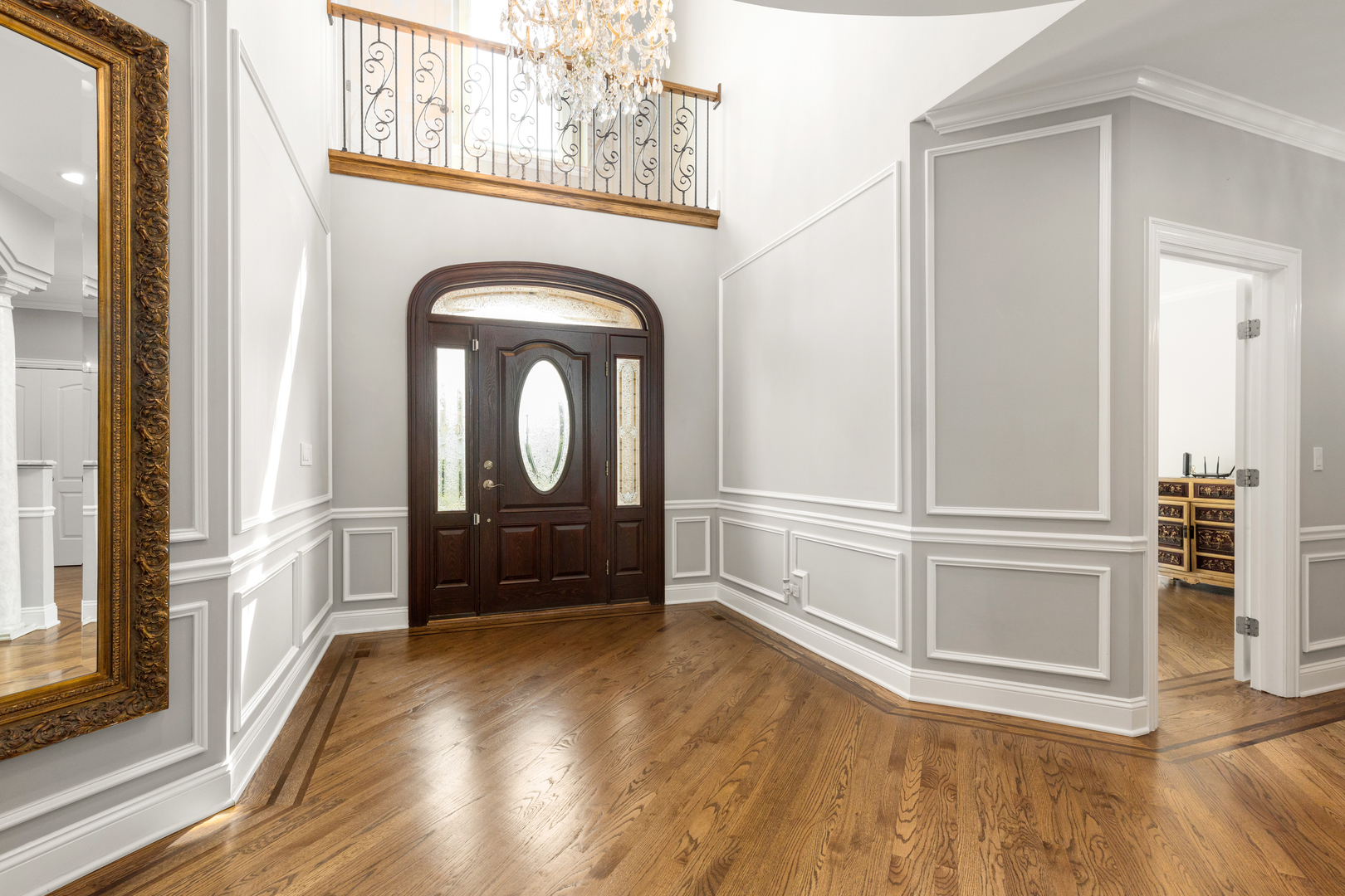 238 Linden Road Northbrook, IL 60062 - Photo 2 of 51 an entryway with wooden floor cabinet and a living room