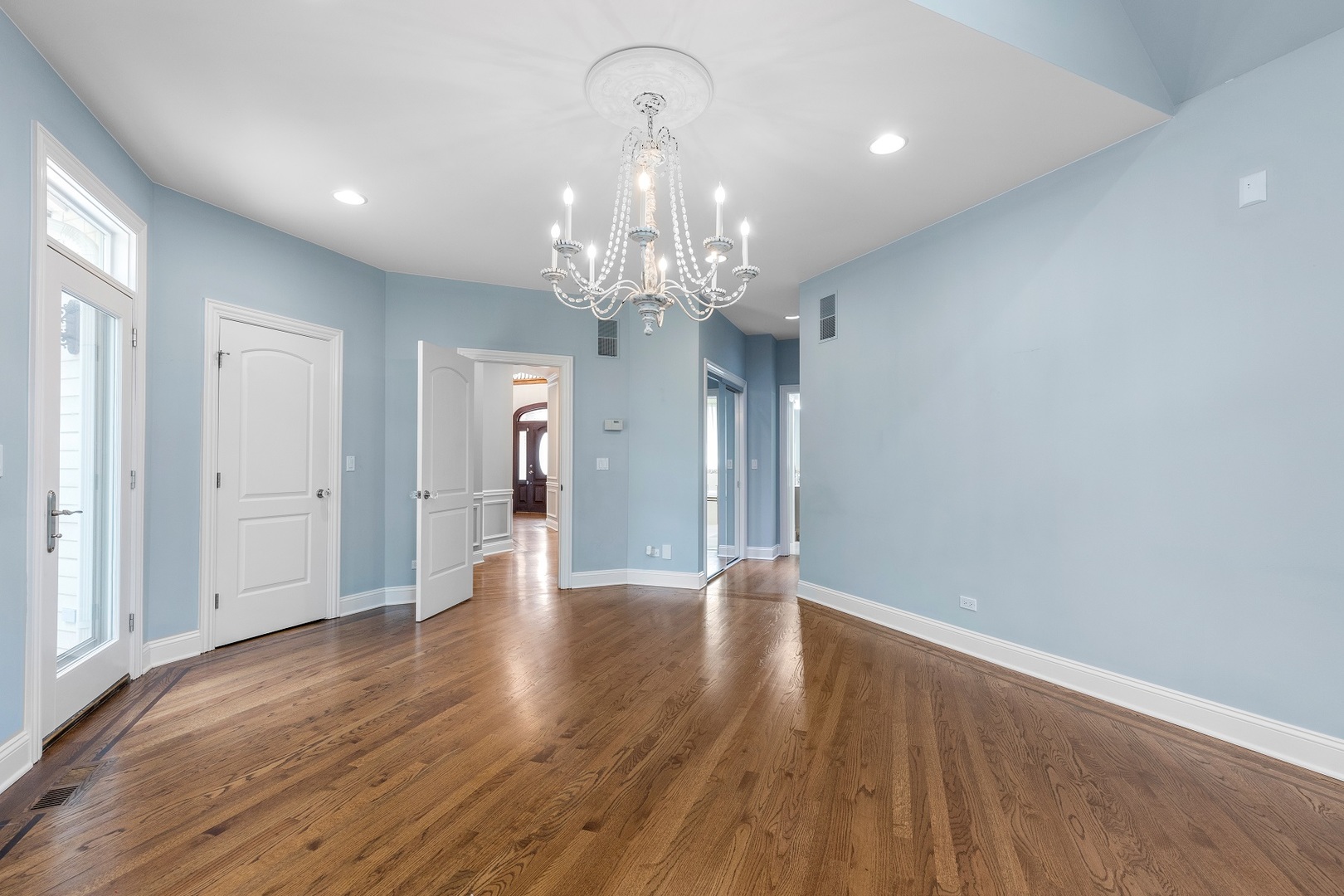 238 Linden Road Northbrook, IL 60062 - Photo 15 of 51 a view of an empty room with wooden floor and a window
