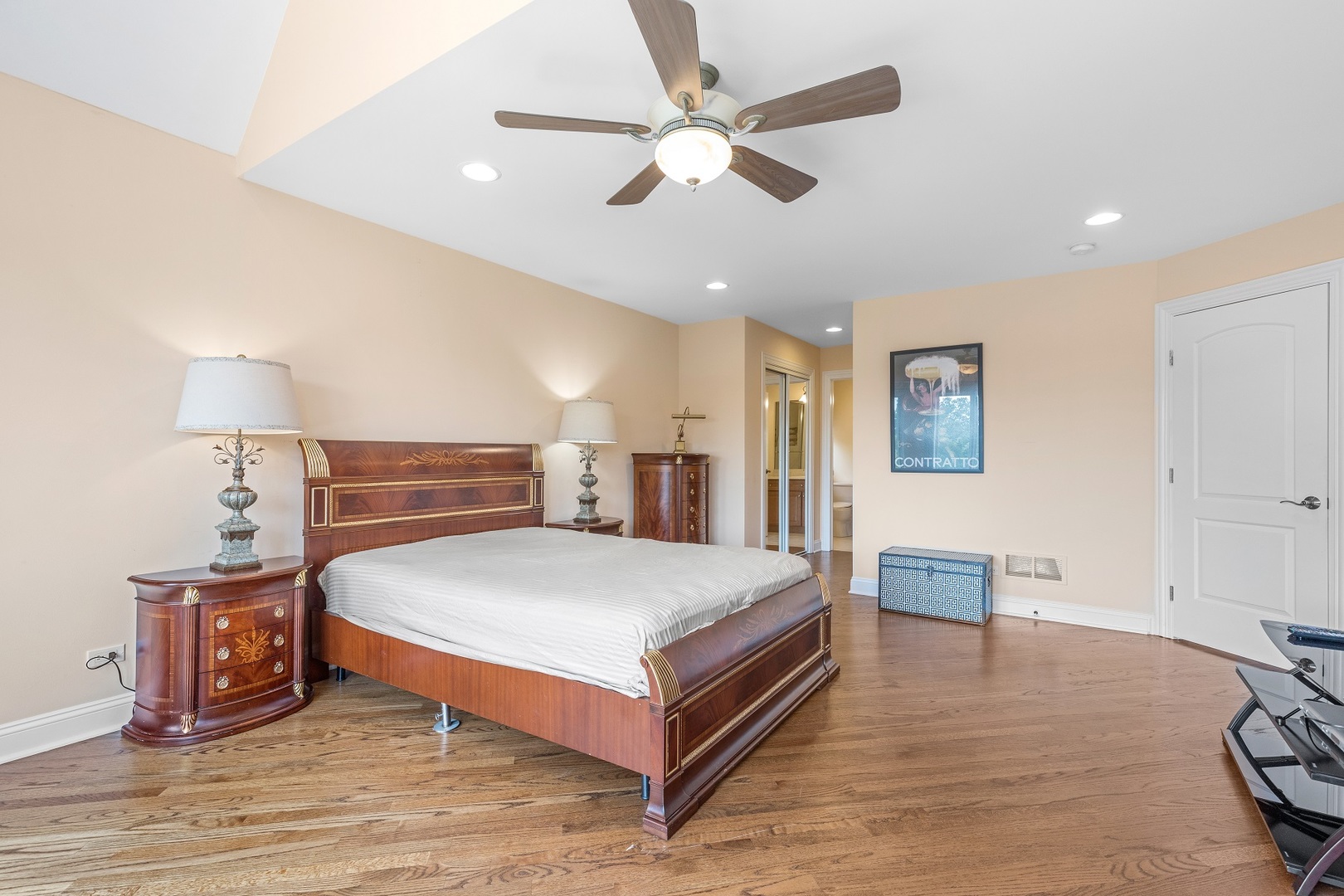 238 Linden Road Northbrook, IL 60062 - Photo 31 of 51 a spacious bedroom with a bed and a table
