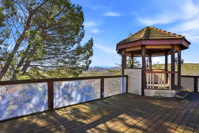 a view of a mountain with a lake