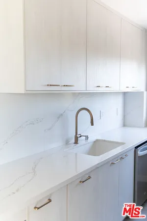 a close view of a sink and tap