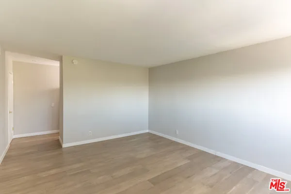 a view of an empty walk in closet