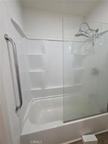 a close view of a bathtub in bathroom