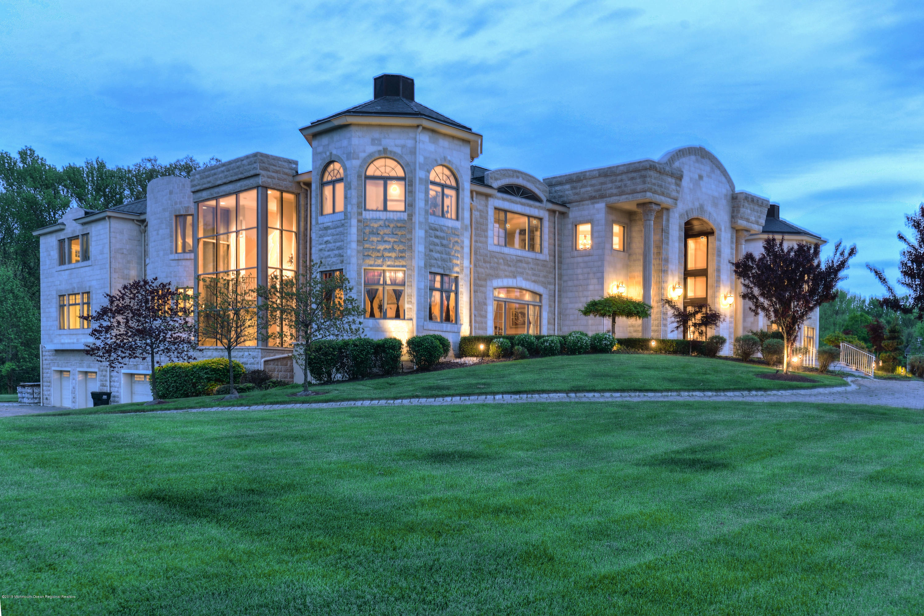 8 Squan Song Lane Colts Neck, NJ 07722 - Photo 1 of 16 a front view of a house with a yard