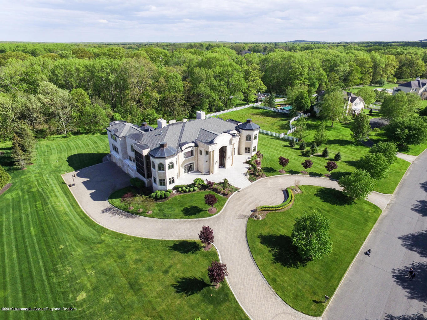 8 Squan Song Lane Colts Neck, NJ 07722 - Photo 2 of 16 a aerial view of a house with a garden