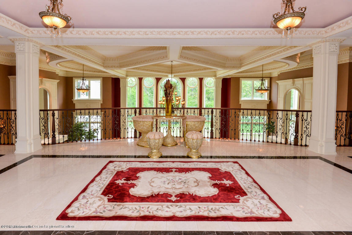 8 Squan Song Lane Colts Neck, NJ 07722 - Photo 15 of 16 a view of a living room and kitchen