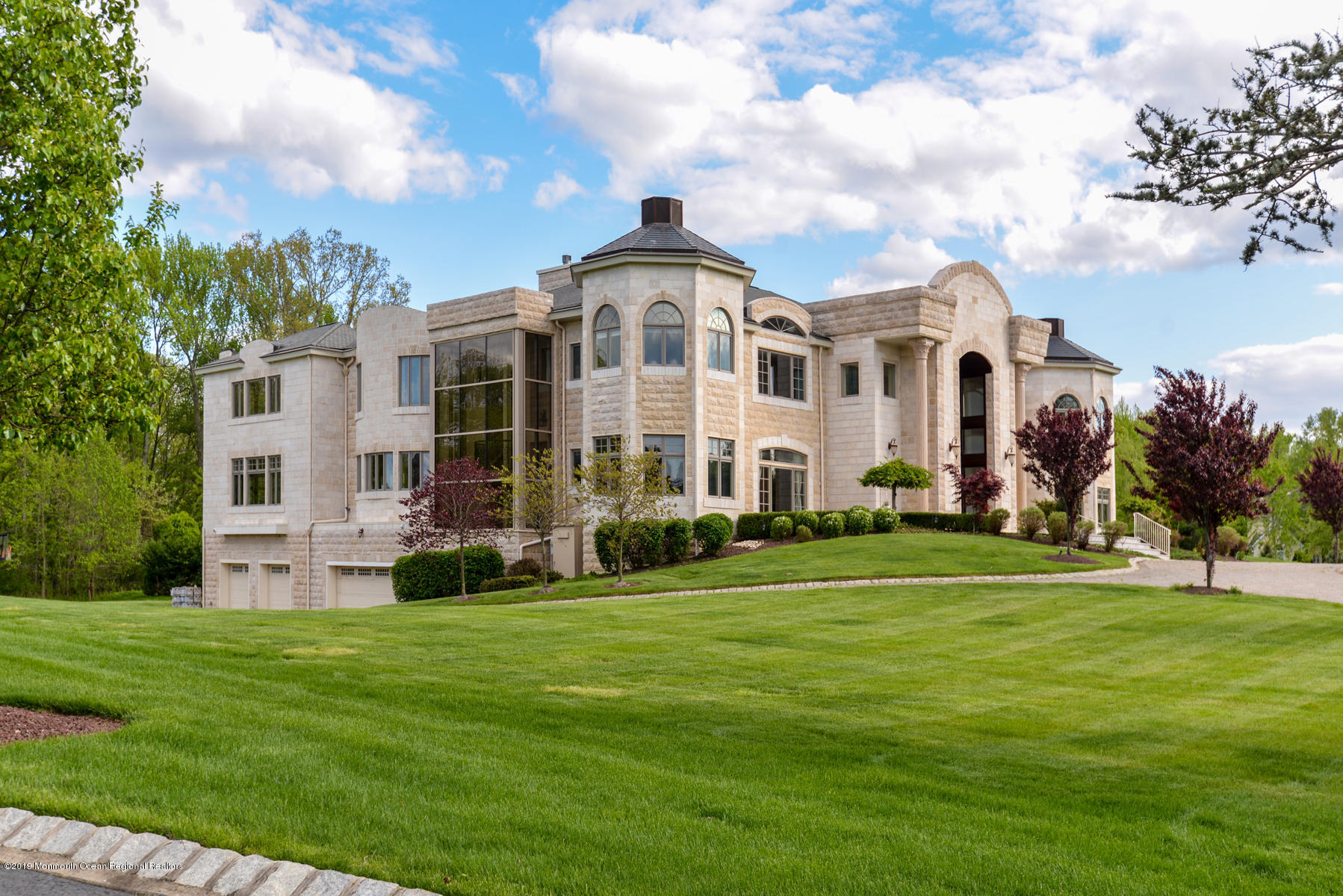 8 Squan Song Lane Colts Neck, NJ 07722 - Photo 9 of 16 a front view of a house with a yard