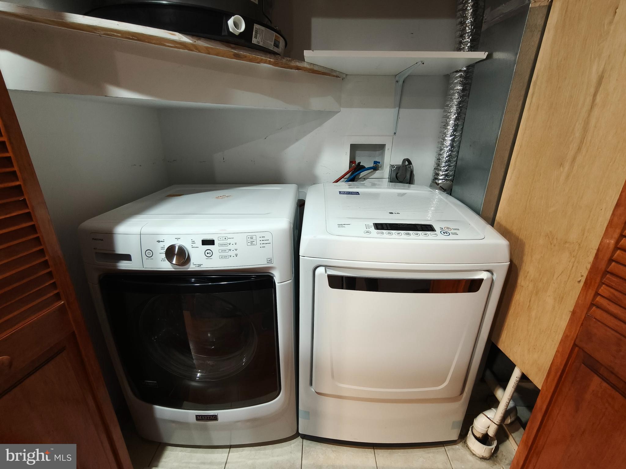 1106 Wallace Street, Unit B Philadelphia, PA 19123 - Photo 7 of 28 a utility room with washer and dryer