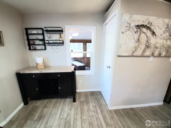 wooden floor with cabinet