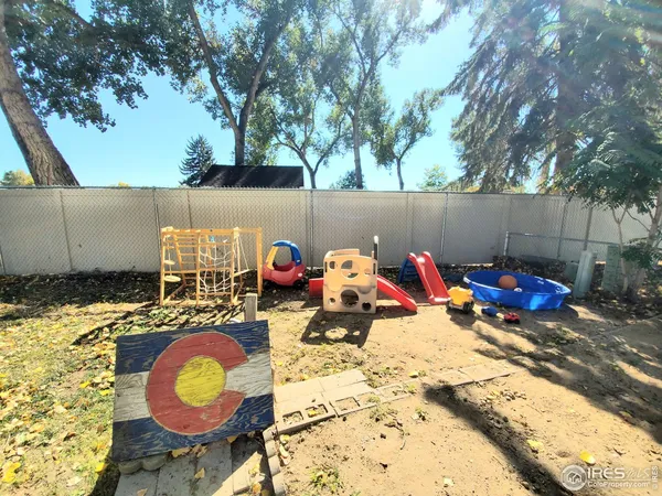 a view of a backyard with a sink and a stove