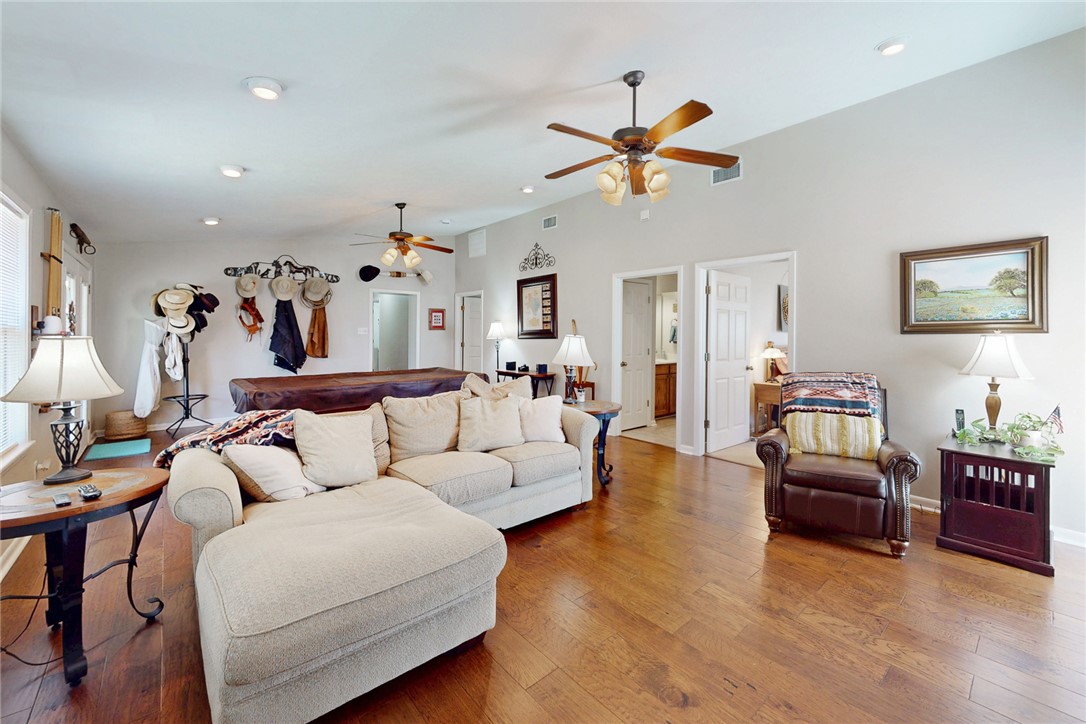 3710 Mancuso Road Bryan, TX 77808 - Photo 26 of 42 Living area featuring wood-type flooring, recessed lighting, and ceiling fan