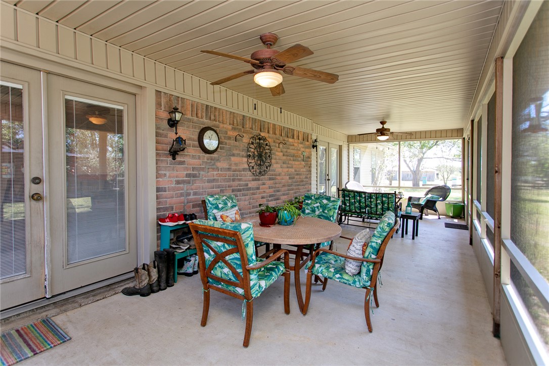 3710 Mancuso Road Bryan, TX 77808 - Photo 28 of 42 Sunroom with a ceiling fan, french doors, and outdoor dining space