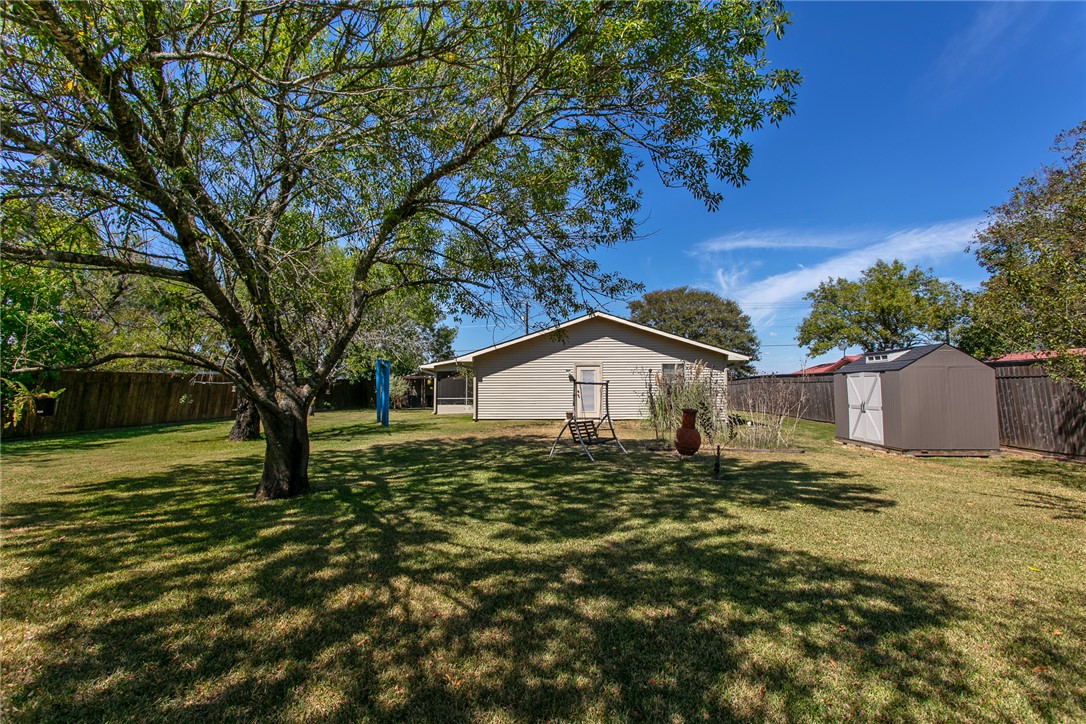 3710 Mancuso Road Bryan, TX 77808 - Photo 34 of 42 Fenced backyard featuring a storage shed
