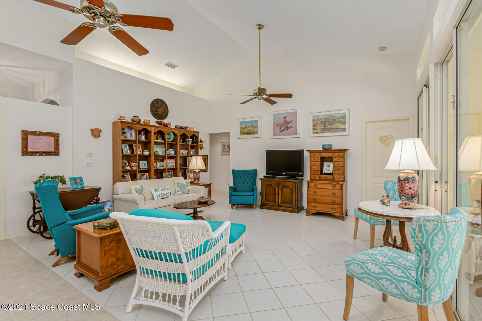 410 Oriole Lane Indialantic, FL 32903 - Photo 28 of 92 a living room with furniture and a flat screen tv