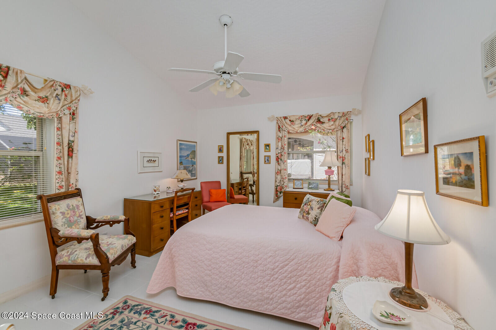 410 Oriole Lane Indialantic, FL 32903 - Photo 40 of 92 a bedroom with a bed and wooden floor