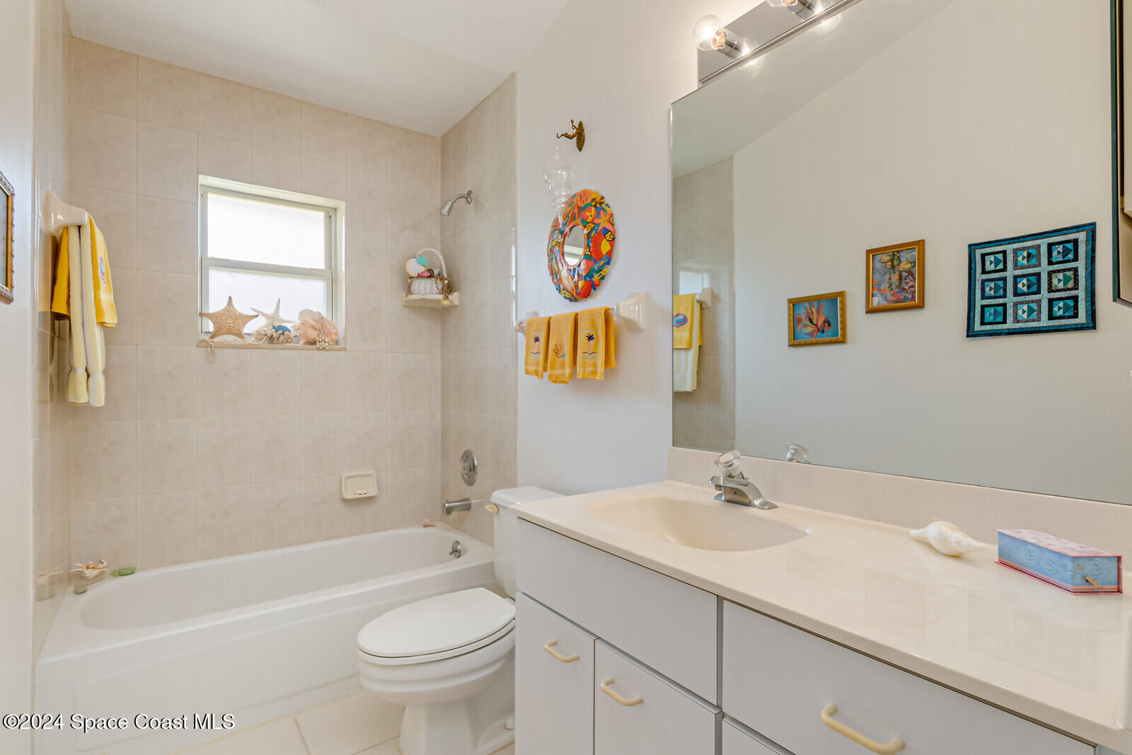 410 Oriole Lane Indialantic, FL 32903 - Photo 44 of 92 a bathroom with a sink a toilet and shower