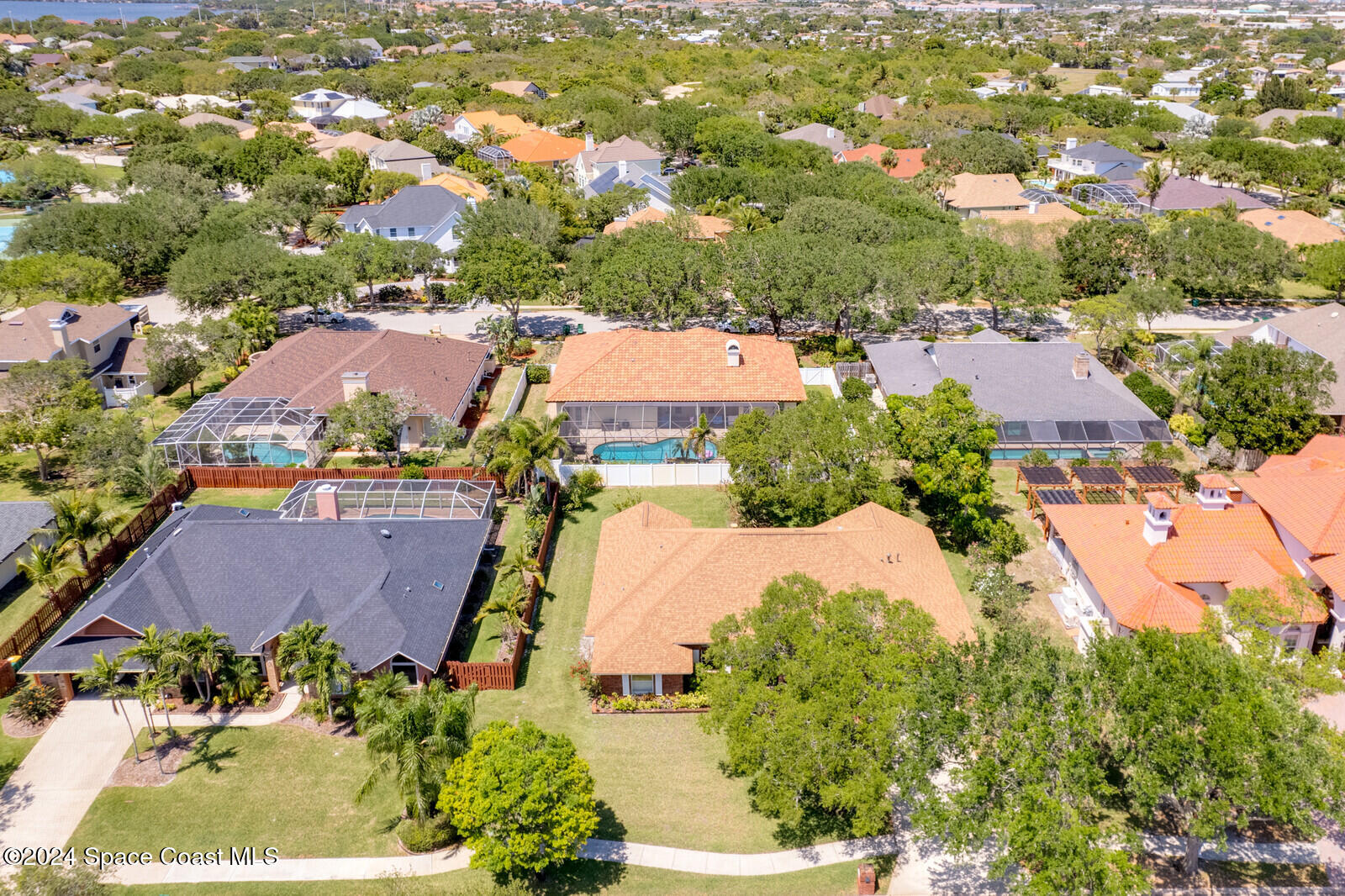 410 Oriole Lane Indialantic, FL 32903 - Photo 54 of 92 an aerial view of residential houses with outdoor space and street view