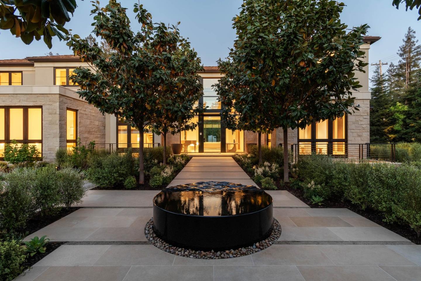 233 Park Lane Atherton, CA 94027 - Photo 3 of 26 a large tree in front of a house