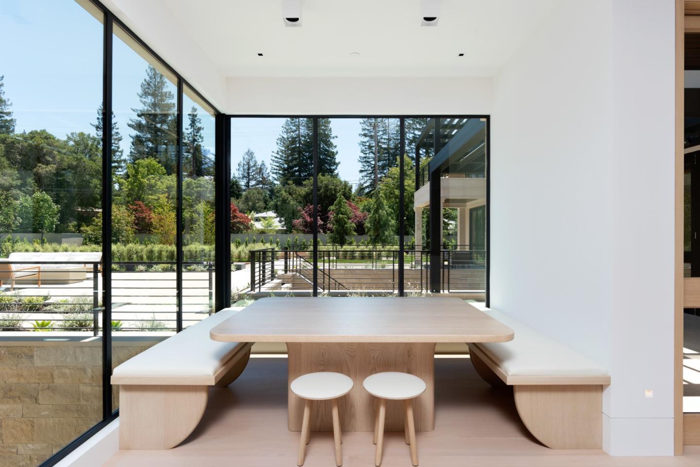233 Park Lane Atherton, CA 94027 - Photo 7 of 26 a view of a patio with a table and chairs