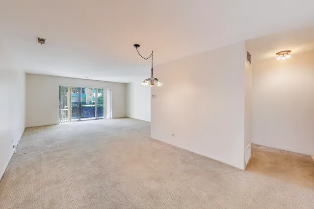 a view of a room with windows