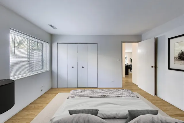 a living room with a couch and a window