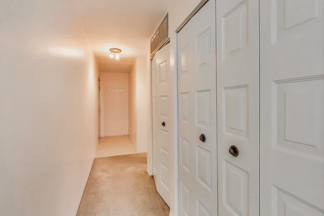 a balcony with view of an outdoor space