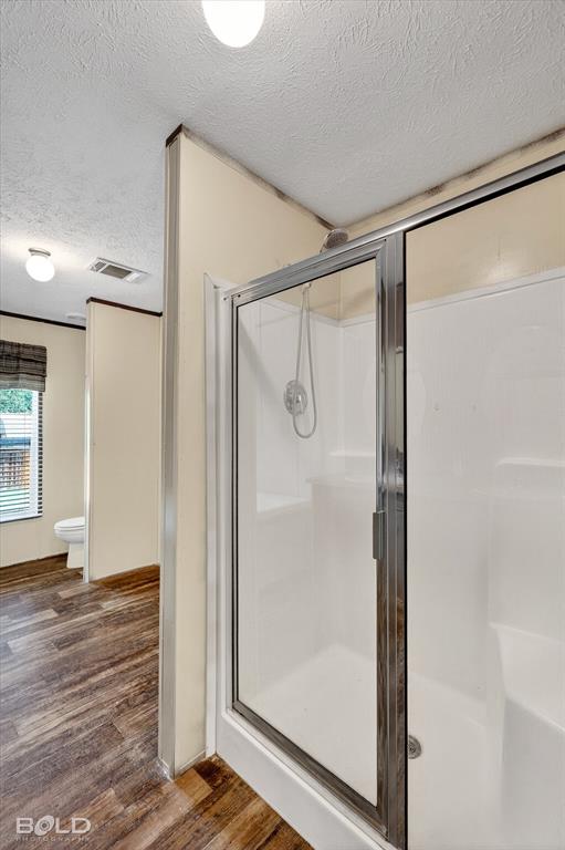 2153 Highway 2 Plain Dealing, LA 71064 - Photo 31 of 39 a bathroom with a glass shower door