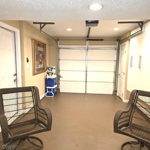 a view of room with air conditioner and window