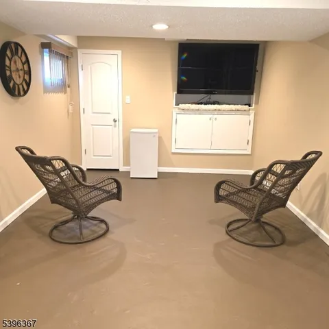 a utility room with sink dryer and washer
