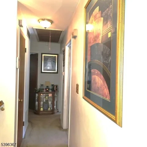 a view of a livingroom with furniture and windows