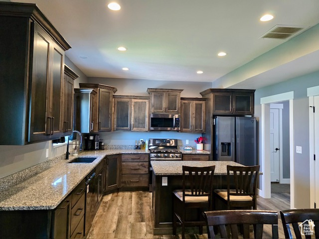 718 700 East Preston, ID 83263 - Photo 6 of 45 Everyone love an island and stainless steel appliances.