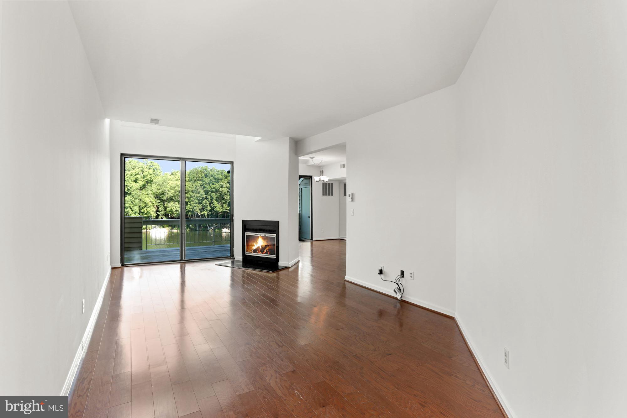 11266 Harbor Court Reston, VA 20191 - Photo 3 of 31 Living room with hardwood floors.
