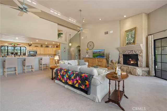 a kitchen with cabinets and a refrigerator