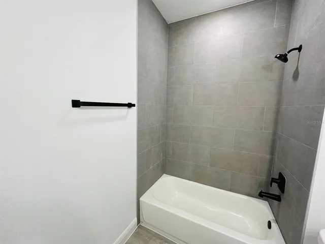 a bathroom with a bathtub
