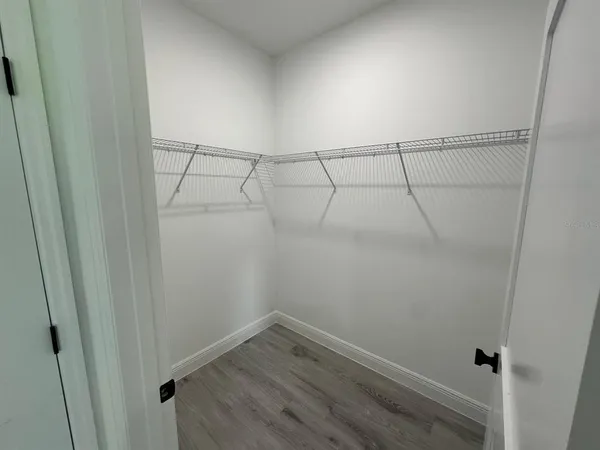 a view of an empty walk in closet