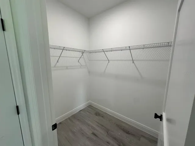 a view of an empty walk in closet