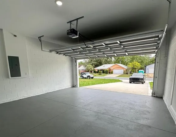 a view of room with window and entryway