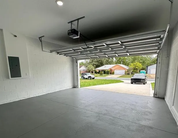 a view of room with window and entryway