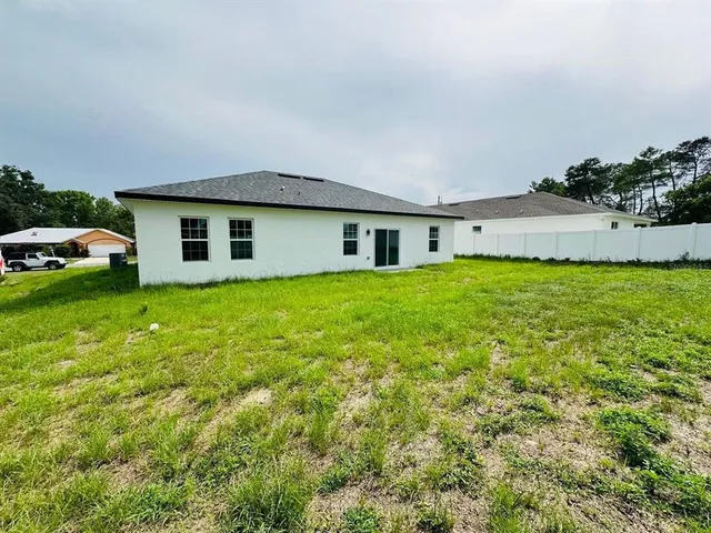 a house view with a garden space