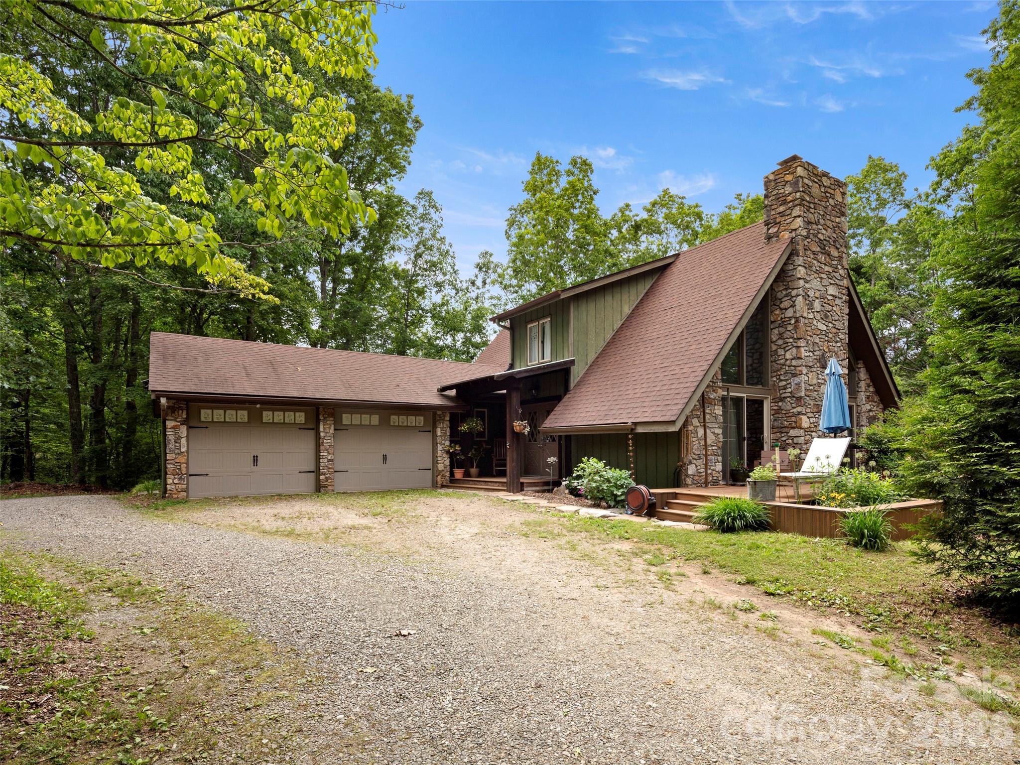 a house with trees in the background